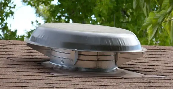 attic fan installation services with low-profile roof ventilation unit in Tampa, FL