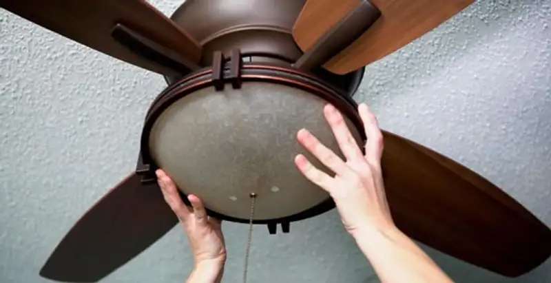 Ceiling fan repair and reinstallation on ceiling mount in Tampa, FL