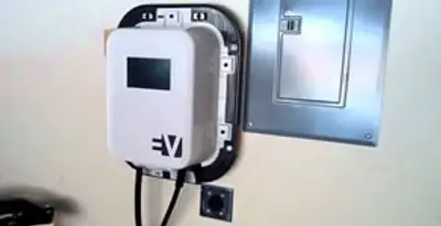 Electric car charger installation with wall-mounted EV charging station in Tampa, FL