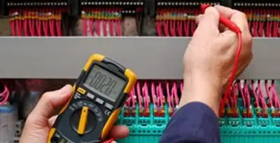 electrical service showing professional testing and troubleshooting of electrical panel by licensed electricians in Tampa, FL