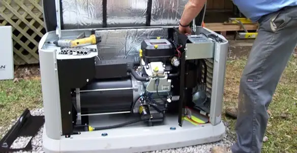 generator installation service showing technician connecting and configuring generator components in Tampa, FL