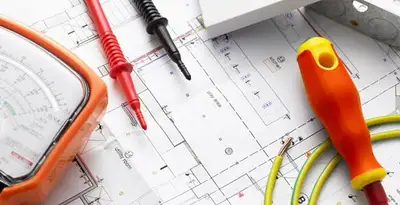 licensed electrician planning and testing electrical systems using professional tools in Tampa, FL