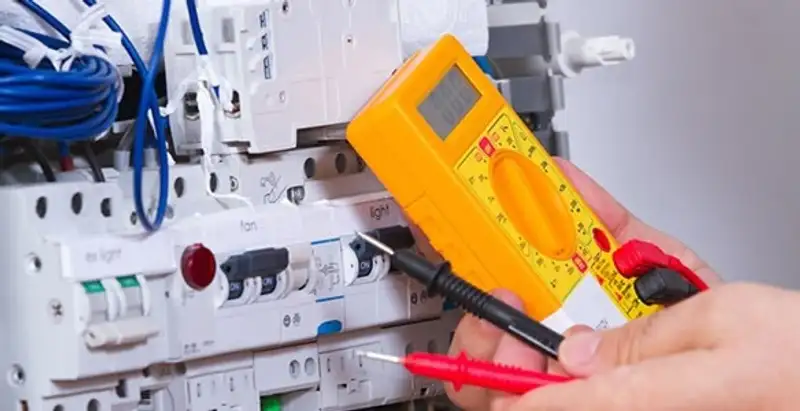 Residential electrician testing home electrical panel for safety and performance in Tampa, FL