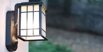 security light installation services with professionally mounted exterior wall light in Tampa, FL
