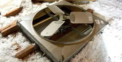 whole house fan installation services with attic-mounted ventilation unit in Tampa, FL