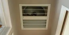 whole house fan installation services with ceiling-mounted ventilation system in Tampa, FL